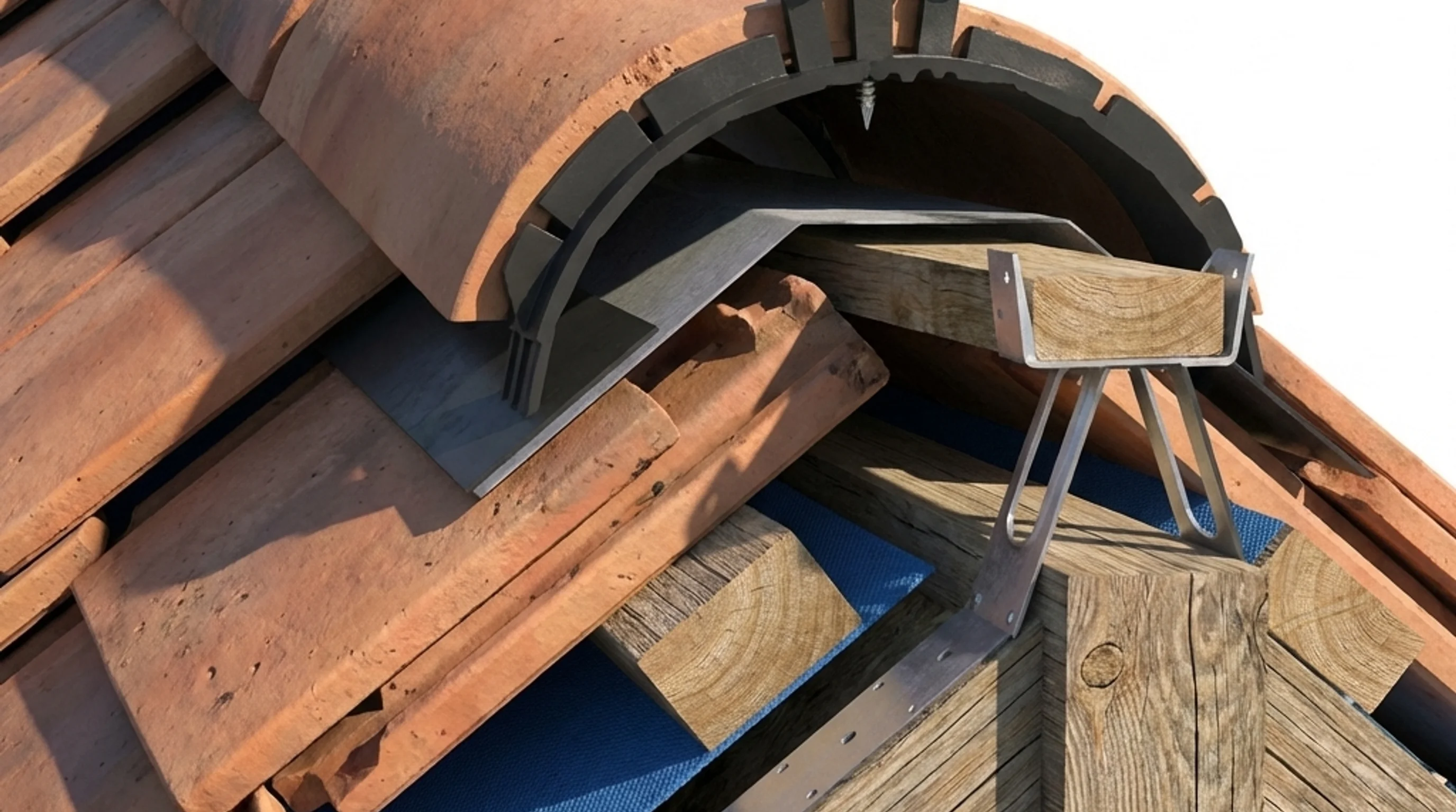 Isometric cutaway of a pitched roof ridge showing a dry ridge system with ventilated membrane, mechanical clips, and ridge tiles installed over battens